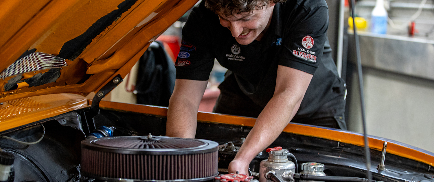 Mechanic working on car