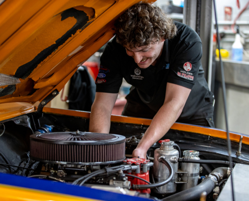 Mechanic working on car